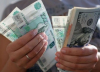 Рублата скочи с близо 3% заради засиленото търсене на пари в брой в Русия