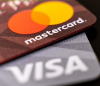 Visa и Mastercard спират всички операции в Русия