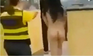 Виетнамска туристка се съблече чисто гола на летище в знак на протест
